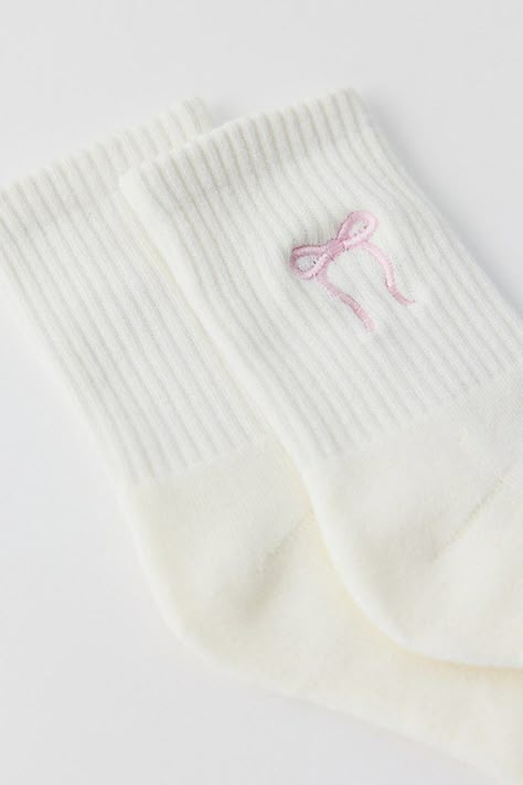 Ultra-soft crew socks with bow detailing at the ribbed cuff. Features Bow quarter crew socks Super soft crew socks Bow detailing at the ribbed cuff Content + Care 80% Cotton, 18% polyester, 2% spandex Machine wash Imported Size + Fit Quarter crew length Fits US women’s shoe size 6–10 | Bow Quarter Crew Sock in White/Pink Bow, Women's at Urban Outfitters Coqquete Socks, Things To Add To My Christmas List, White Socks Black Shoes, Cute Pink Socks, Girly Stocking Stuffers, Pink Bow Owala, Cute Socks For Women, Pink Socks Aesthetic, Cute Crew Socks