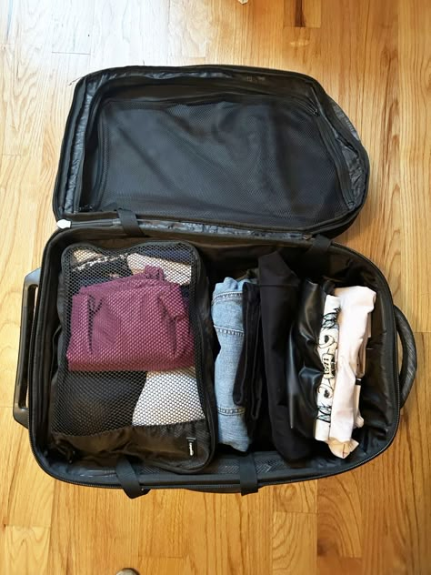 Suitcase on floor packed with rolled clothes and mesh bag Concept Phones, Tire Pictures, Suitcase Packing Tips, Shopping Pictures, Packing Bags Travel, Galaxy Wallpapers, Apple Gift Card, Travel Cubes, Small Suitcase