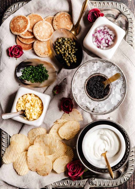 How To Serve Caviar Appetizers - Celebrations at Home Cozy Nye At Home, Nye Champagne Bar, New Year’s Eve Party At Home Ideas, Nye Platters, Nye Dinner Menu Ideas, Nye Dinner Table Decor, New Year’s Eve Menu Party, Nye Dinner Party Ideas, New Year’s Eve Party Dinner