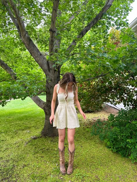 White Dress With Brown Cowboy Boots, Cowboy Boots With White Dress, Sun Dress With Cowgirl Boots, Cottage Cowgirl Outfits, Sun Dresses And Cowboy Boots, Short Dresses With Cowboy Boots, Summer Dress Cowboy Boots, Cowgirl Boots And Dresses, Dress Outfits With Cowgirl Boots