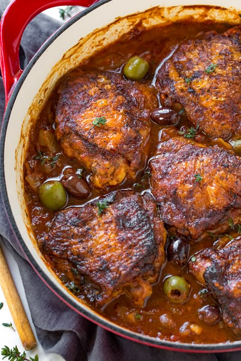 Rustic and saucy, this rich and flavorful braised chicken with tomatoes and olives, plus a tiny hint of white wine, is a simple peasant-style meal finished in the oven to juicy perfection, served with your favorite side. | thecozyapron.com #recipes #dinnerideas #chickenrecipes #braisedchicken Braised Chicken Recipes, Braised Chicken Thighs, Dutch Oven Recipes, Duck Recipes, Individual Servings, Braised Chicken, French Recipes, Kitchen Stories, Snacks Für Party