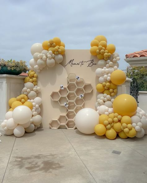 Create with Kait LLC on Instagram: "How absolutely beautiful is this Mama to Bee setup! 🐝♥️🍯   The 3D honeycomb really tied the whole display together. And I loving the touch of the little bees 🐝 shoutout to Canva for another amazing image!  The color pallete of mustard from @tuftexballoons , dusk cream and white sand from @sempertex turned this cloudy day into sunshine ☀️   Signage: @theaccentsshop  Honeycomb: @shopmannythings  Design: @balloondesignsbygina  Collaboration with @balloondesignsbygina  Rentals @createaparty  Florals @lakeforest.floral   #babyshowerideas  #mamatobee #beebabyshower #babybee #mamatobeebabyshower #genderneutral #neutralbabyshower #neutralthemes" Honeycomb Birthday Decoration, Honeycomb Baby Shower Ideas, Honeycomb Photo Backdrop, Bee Balloon Arch, Baby Shower Honey Bee Theme, Parents To Bee Baby Shower Party Ideas, Bee Baby Shower Ideas, Baby Shower Bee Theme Decorations, Mama To Bee