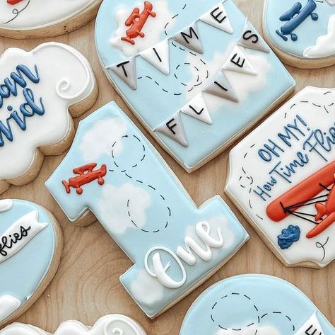 Frosted Little Crumbs on Instagram: "Time flies ✈️ • • • #airplanecookies #timefliescookies #cloundcookies #1stbirthdaycookies #birthdaycookies" How Time Flies Birthday Party, Time Flies First Birthday Cookies, Airplane First Birthday Party Cake, Two Fly Birthday Cookies, Airplane Cookies 1st Birthday, Time Flies Birthday Party Cake, My Oh My How Time Flies Birthday, Time Flies Cookies Airplane Party, Time Flies Birthday Cookies