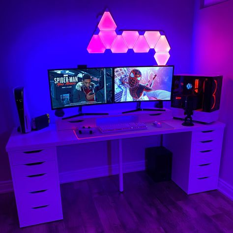 My gamer setup in blue, red and pink light, Ikea desk with custom-built PC, PS5 console, Nintendo Switch, Razer peripherals, dual monitors. Playing Marvel's Spider-Man: Miles Morales on PlayStation. Nanoleaf RGB panels light up pink. Nanoleaf Lights, Gaming Pc Setup, Gaming Desk Setup, Gaming Case, Game Setup, Best Gaming Setup, Neon Bedroom, Pod House, Dream Desk