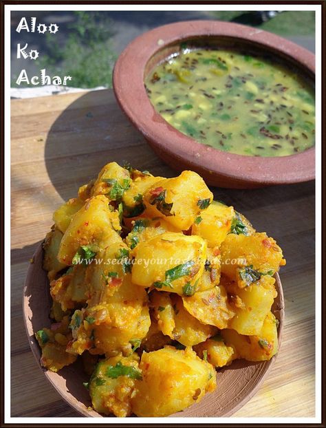 This is one of the recipes that I had bookmarked a long time ago.Finally I got to make it as a part of the meal for N for Nepal in the Culinary journey across the globe.This is a flavorful potato curry that goes well with Rice / Roti.   Aloo ko Achar with Rahar ko… Nepalese Potato Salad, Nepali Food Recipes, Himalayan Recipes, Tibet Recipes, Nepal Recipes, Nepali Dishes, Nepali Recipes, Easy Baked Dinner, Nepali Cuisine