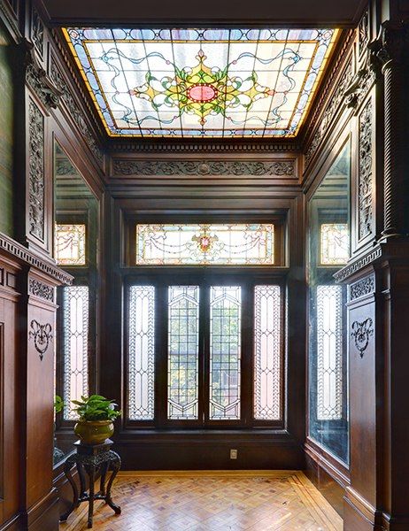 The interiors feature exquisite original details, including coffered ceilings, inlaid parquet flooring, wood paneling, hand-painted frescoes and murals, and stained-glass accent windows. Victorian Life, Victorian Interior, Victorian Interiors, Brooklyn Brownstone, زجاج ملون, This Old House, Victorian Houses, Victorian Home, Gilded Age