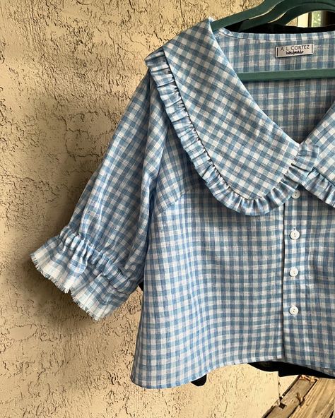 👚 Collared cuties 😍😍 Peter Pan collars, gingham, cottagecore aesthetic and alllll those ruffles are still THE moment right now— why not dive in? I loved creating these custom blue gingham and black gauze blouses for a client, based on the original floral version that I have in my inventory! 🌸 Swipe ➡️ to the end to see all of the fabrics I have available to make this top out of! Sizes XS-3X are all possible (depending on specific fabric choice). For my locals, don’t forget that I’ll be at... Peter Pan Collar Aesthetic, Collared Blouse Outfit, Collar Blouse Outfit, Gingham Cottagecore, Cottagecore Fits, Cottagecore Blouse, Peter Pan Collar Top, Parts Work, Peter Pan Collar Shirt