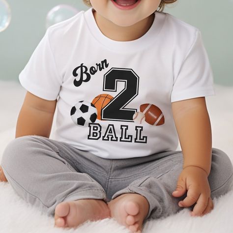 Celebrate your little MVP's 2nd birthday with the Born 2 Ball Sport Themed Toddler T-shirt! This adorable shirt is perfect for your sports-loving toddler's special day. Made with high-quality materials, this shirt is comfortable and stylish for any birthday celebration. Get ready to score some major style points with this cute and sporty design! #2ndBirthday #ToddlerFashion #SportsTheme #Born2Ball #BirthdayParty #ToddlerStyle #SportsFan #BirthdayOutfit #KidsApparel #SportyKids 2nd Birthday Party Invitations, Born 2 Ball, Boy 2nd Birthday, Toddler Boy Clothing, 2nd Birthday Boys, Toddler Girl Clothing, Ball Birthday Parties, Birthday Boy Shirt, Ball Birthday