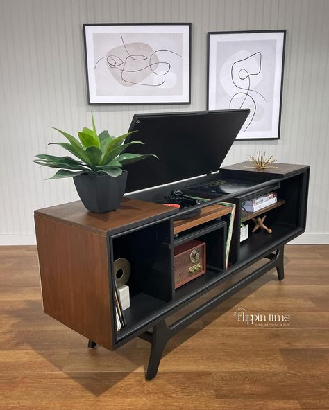 Talk about a comeback! 🙌 This mid-century GE stereo console was neglected, obviously exposed to the elements, and beyond repair—legs broken with one missing, bottom rotted, you name it. But after some serious restoration work, it’s now a sleek, repurposed, functional piece ready to shine again. 🎶✨ Perfect for vinyl, books, and decor! Swipe to see the full journey from wrecked to restored. ✨ Painted in a custom mix of London Black and Jet Black from @melangepaints ✨ Stained in Antique Waln... Vintage Stereo Console Makeover, Stereo Console Makeover, Stereo Cabinet Ideas, Stereo Cabinet Redo, Console Makeover, Vintage Stereo Console, Record Player Console, Stereo Console, Redo Cabinets