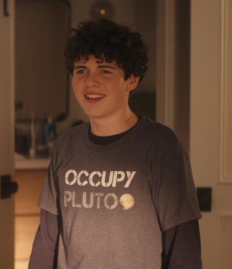 Occupy Pluto T-Shirt Worn by Brady Noon as Wyatt in Family Switch (2023) Family Switch, Brady Noon, Parent Dr, Black Leather Motorcycle Jacket, Movie 2023, Sherpa Hoodie, Quilted Puffer Jacket, Next Fashion, Knit Sleeve