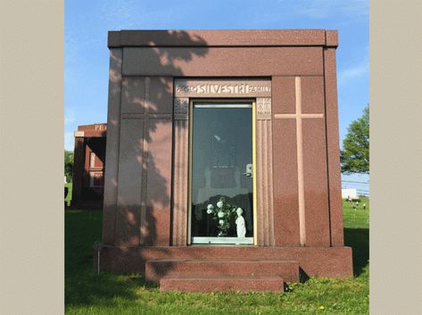 These types of mausoleums are for sale with prices starting at $85,000 for 2 to 4 crypts. Walk-in mausoleums with 6-8 crypts start at $145K. Crypts are located in the interior of the free standing mausoleum. The mausoleum pictured here was sold to the Silvestri family and installed in the Mt. Olivet Catholic Cemetery. It includes a glass door and a small vestibule. The name of the family, Silvestri, was carved into the granite above the door. Mausoleum Design, Garage Mausoleum, Small Mausoleum Modern Design, Family Mausoleum, Victorian Mausoleum, Monument Ideas, Catholic Family, Memorial Park, Classical Art