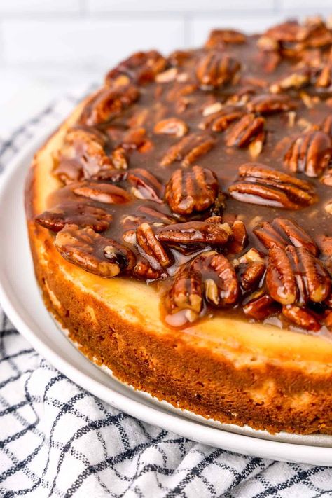 Decadent and delicious Pecan Pie Cheesecake is the perfect combination of a rich, creamy cheesecake with buttery, sweet pecan pie filling. New Year Desserts, Vanilla Wafer Crust, Gingerbread Spice, Vanilla Wafer, Pecan Pie Cheesecake, Pecan Pie Filling, Pecan Cheesecake, Chai Coffee, Pie Cheesecake