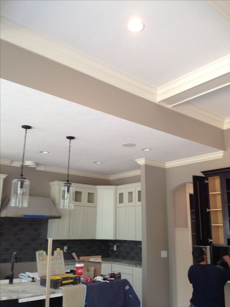 different ceiling heights Ceiling Height Transition Between Rooms, Raising Ceiling Height Before And After, How To Hide Beam In False Ceiling, Raise Ceiling Height, Varying Ceiling Heights, Taller Ceiling Illusions, Kitchen Into Living Room, Different Ceiling Heights, Expand Kitchen