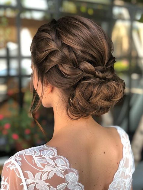 Elegant and Versatile Braided Bun Hairstyles Braided Updo For Bridesmaid, Braided Hairstyles For Wedding The Bride, Braided Low Bun Wedding, Bride Updo Hairstyles With Braid, Braids Hairstyles Bride, Brown Hair Wedding Hairstyles Updo, Low Bun Wedding Hair Braid, Wedding Hairstyles For Bride Bun, Christian Bridal Bun Hairstyle