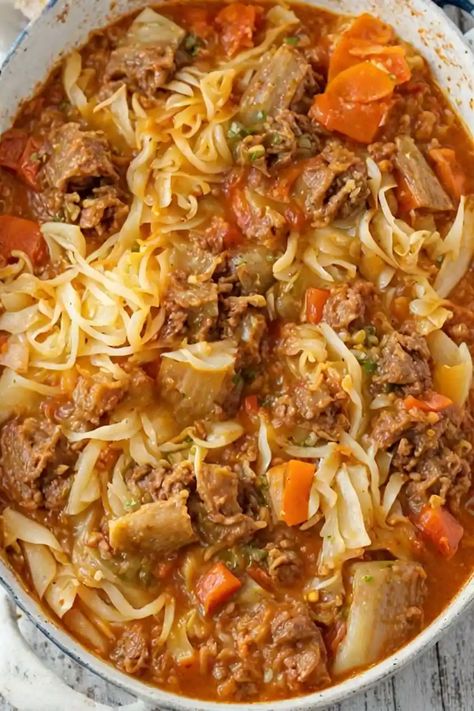 Cabbage Roll Soup Recipe

Ingredients

- 1 pound ground beef or turkey
- 1 small onion, chopped
- 3 cloves garlic, minced
- 1 can (15 ounces) diced tomatoes
- 1 can (15 ounces) tomato sauce
- 1 cup beef or vegetable broth
- 1 small head of cabbage, chopped
- 1 teaspoon dried thyme
- 1 teaspoon dried oregano
- Salt and pepper to taste
- 1/2 cup uncooked rice
- 1 tablespoon olive oil

Full Cooking Instructions on... Turkey Cabbage Soup, Cabbage Roll Soup Recipe, Easy Cabbage Rolls, Oregano Salt, Cabbage Roll Soup, Dinner Ideas Recipes, Soup With Ground Beef, Cabbage Roll, Dried Thyme