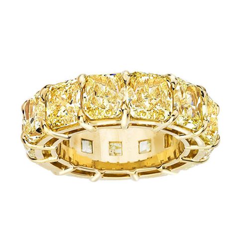 Fancy Yellow Radiant Cut Eternity Band | From a unique collection of vintage wedding rings at http://www.1stdibs.com/jewelry/rings/wedding-rings/ Emerald Cut Diamond Rings, Diamond Band Rings, Goodluck Charms, Sapphire And Diamond Band, Vintage Wedding Rings, Yellow Diamond Engagement Ring, Emerald Cut Diamond Ring, Rings Luxury, Fancy Yellow Diamond