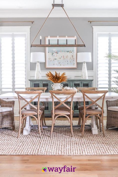 Dining room inspiration, right this way. Bring in woven seating, a jute area rug, beach-inspired wall art to make this look yours. Coastal Dinning Room, Coastal Farmhouse Dining Room, Beach Dining Room, Informal Dining, Fall Dining Room, Coastal Dining Room, Autumn Dining, Coastal Dining, House Dining Room