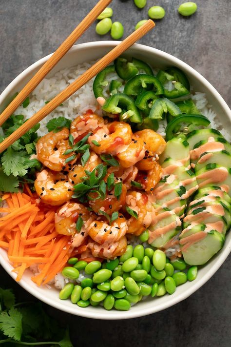 These Spicy Shrimp Rice Bowls are fiery and flavorful! Each rockin' rice bowl is loaded with spicy shrimp, fresh veggies, and tons of tasty toppings! Spicy Shrimp Bowl, Shrimp Rice Bowl Recipe, Shrimp Bowl Recipe, Shrimp Rice Bowl, Shrimp Bowl, Poached Chicken Breast, Rice Bowl Recipe, Shrimp Rice, Healthy Bowls Recipes