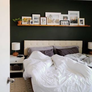 Above Bed Photo Display, Ledge Above Bed, Picture Ledge Above Bed, Photos Above Bed, Plants In The Bedroom, Photo Ledge, Small Condo, Aspen Wood, Bed Photos