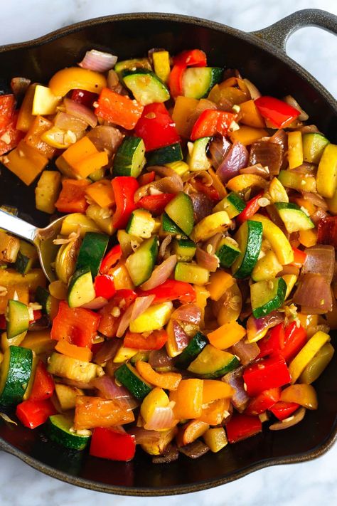 Easy sautéed vegetables recipe! We love this dish with onion, zucchini, bell pepper, and garlic, but you can substitute or add your favorite vegetables. These sautéed veggies are […] Zucchini Mixed Vegetables, Sauteed Zucchini And Peppers, Cooking Fresh Vegetables, Balsamic Veggies Sauteed, Bell Pepper Zucchini Onion, Cast Iron Skillet Vegetables, Peppers And Zucchini Recipes, Veggie Melody Recipe, Fried Bell Pepper Recipes