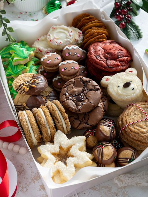 This year's Christmas cookie box includes 12 delicious recipes and all my tips and tricks for making the perfect treat box!! Christmas Gift Ideas Baked Goods, Selling Christmas Cookies, Home Made Christmas Cookie Recipe, Festive Baked Goods, Cookie Box Ideas Christmas, Christmas Baking Ideas For Gifts, Christmas Yummy Treats, Christmas Inspired Cookies, Christmas Classic Recipes