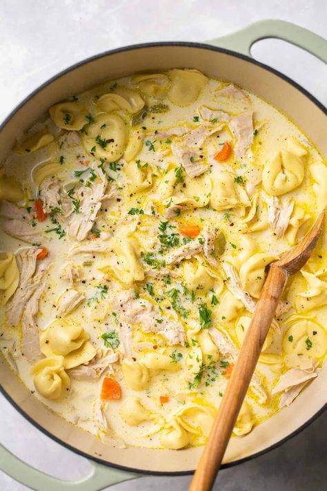 This Creamy Chicken Tortellini Soup is a dreamy take on classic chicken noodle soup, with cheesy tortellini and a creamy, comforting broth. Pair this with some warm, crusty bread and you have the perfect winter meal! Chicken Tortillini Soup, Tortellini Soup Crockpot, Creamy Chicken Tortellini Soup, Creamy Chicken Tortellini, Instant Pot Chicken And Dumplings, Tasty Noodles Recipe, Classic Chicken Noodle Soup, Cheesy Tortellini, Creamy Tortellini Soup