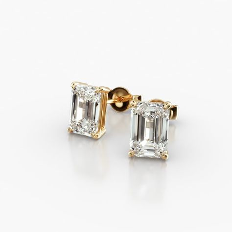 14K Yellow Gold Emerald Cut Lab-Grown Diamond Stud Earrings (1.50 CTW - F-G / VS2-SI1). This pair of classic pear shape diamond earrings feature a tapered basket, showcasing the unique characteristics and striking outline of a pear shape diamond. Splinters of light shimmer and shine with every move. Emerald Cut Diamond Earrings, Jewelry Photoshoot, Emerald Cut Diamond, Unique Characteristics, Diamond Stud Earrings, Pear Shaped Diamond, Diamond Stud, Emerald Cut Diamonds, Wedding Things