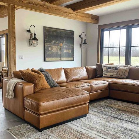 Leather Couch Cabin Living Room, Brown Leather Couch With Ottoman, Family Room Design Brown Leather Couch, Oversized Leather Sectional, Cognac Couch Living Room Ideas Farmhouse, Light Tan Leather Couch Living Room, Camel Couch Living Room Ideas, Leather Sectional Living Room Decor, Cozy Leather Couch Living Rooms