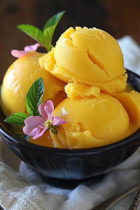 A refreshing and creamy sorbet made with fresh mangoes. Dessert Bullet Recipes, Vegan Ice Cream Brands, Yonanas Recipes, Carrot Cake Banana Bread, Fruit Deserts, Spiced Cashews, Vegan Nice Cream, Cake Banana Bread, Flax Eggs