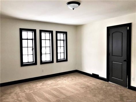 Charcoal Baseboards, Black Trimming Interior, Black Trim Baseboards, Dark Colored Baseboards And Trim, Matte Black Baseboards, Black Stained Trim Interior, Black Doors And Baseboards, Black Baseboards And Doors, Dark Baseboards And Trim Farmhouse