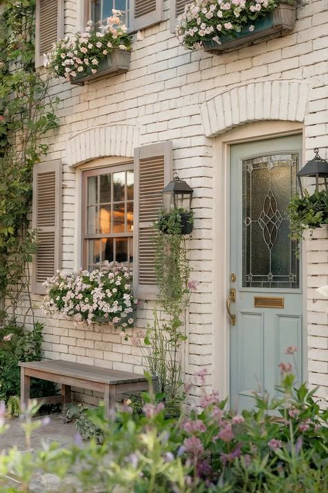 24 Inspiring Vintage Home Exterior Designs: Detailed Guide | by Berhanbicak | Oct, 2024 | Medium Cutest House Exterior, Small Cream House Exterior, Brick English Cottage Exterior, Updated Victorian Exterior, Outside Cottage House, White And Blue Cottage Exterior, Cute House Ideas Exterior, Colored Brick House Exterior, Quaint Cottage Exterior