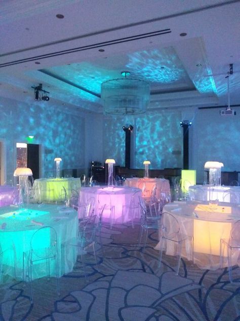 Venture under the sea with this unique glowing jellyfish display! Make your event unforgettable! 🐟️ Underwater Quinceanera, Mermaid Theme Quinceanera, Under The Sea Quinceanera Theme Dresses, Under The Sea Gala, Under The Sea Sweet 16, Under The Sea Quinceanera Theme, Under The Sea Prom, Grad Themes, Under The Sea Wedding