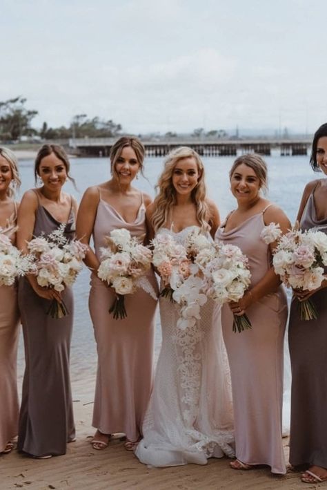 Elegant bridesmaids in mismatched satin dresses in soft blush and coral for luxury outdoor wedding | Bridesmaids | Bridesmaids dresses | Mismatched bridesmaids | Odd number bridesmaids | Blush bridesmaids | Pink bridesmaids | Coral bridesmaids | Satin bridesmaid dressed | Cowl neck bridesmaids | Spaghetti strap bridesmaid dresses | Bridesmaid hair style | Bridesmaid flowers | Bride tribe | Bridal squad Bridesmaid Dresses Abroad Wedding, Two Colour Bridesmaid Dresses, Neutral Bridesmaids Dresses Mismatched, Multi Tone Bridesmaid Dresses, Mismatched Bridesmaid Dresses Color Schemes, Mixed Blush Bridesmaid Dresses, Miss Matching Bridesmaid Dresses, Alternating Bridesmaid Dress Colors, Neutral Bridesmaid Dresses Mismatched Color Schemes