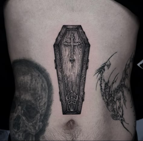 Black Coffin Tattoo Design, Small Coffin Tattoo Simple, Knee Tattoo Unique, Gothic Coffin Tattoo, Spooky Aesthetic Tattoo, Casket Tattoo Design, Small Dark Tattoos For Men, Gothic Filler Tattoo, Gothic Throat Tattoo