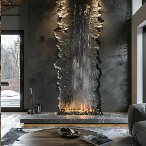 Imagine a fireplace that embodies the serene majesty of a cascading waterfall, bringing the soothing sights and sounds of nature into your living space. Crafted from polished stone in hues of slate and granite, its mantelpiece mimics the rugged edges of cliffs, adorned with moss and tiny ferns that thrive in the mist. Water gently flows down the front in a seamless curtain, catching the firelight as it dances across the smooth surface, creating a mesmerizing play of shadows and reflections. T... Interior Waterfall Design, Living Room Waterfall, Waterfall In Living Room, Waterfall Fireplace, Waterfall Interior, Interior Waterfall, Water Fireplace, Water Curtain Wall, Indoor Waterfall Wall