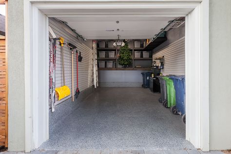 The concrete flooring and foundation were finished with a Nightfall Floortex floor coating. Gray slatwalls were installed with hooks and baskets to increase the amount of wall storage. A four foot LED light brightens up the space and the entire garage was painted to make it all look like new. Storage bins were also used to reduce the clutter and keep the space looking tidy. 1 Car Garage Organization Ideas, Single Car Garage Organization, Carport Ideas, Garage Storage Inspiration, Garage Organizer, Garage Design Interior, Garage Organization Tips, Garage Organisation, Organization Garage