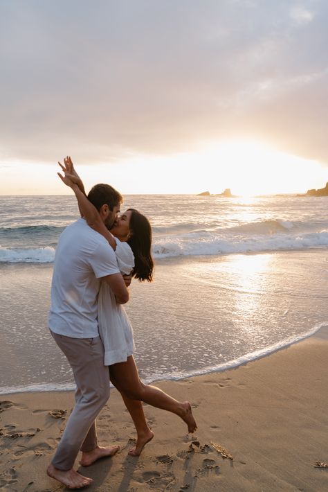 Spring Laguna Beach Engagement Photos | Beach Engagement Photos | Natasha Daboub Photography | Looking for beach engagement photo inspiration! These Laguna Beach engagement photos were a dream! Find more Laguna Beach engagement photoshoot ideas, beach engagement photos outfit inspiration, beach engagement shoot ideas, and beach engagement photos sunset inspo! Book Natasha as your Orange County engagement photographer or Orange County wedding photographer at natashadaboubphotography.com! Beach Self Photoshoot, Jean Beach Photoshoot, Carmel By The Sea Engagement Photos, Cabo Engagement Photos, Beach Engagement Photo Ideas, Beach Engagement Photos Casual, Sunrise Beach Engagement Photos, Sunrise Beach Engagement Photoshoot, Ocean Engagement Photos