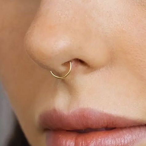 Faux hoop non piercing jewelry 2000. Swipe to see uses Septum Gold Ring, Different Nose Piercings, Small Septum Piercing, 14g Septum, Gold Septum Piercing, Silver Nose Piercing, Small Septum, Septum Gold, Gold Septum Ring