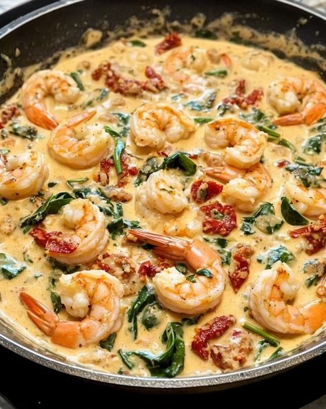 Indulge in this Easy Creamy Tuscan Shrimp recipe! Quick to make, packed with garlic, sun-dried tomatoes, and spinach for a deliciously savory dish. #TuscanShrimp #QuickRecipes #CreamyPasta #SeafoodLovers #EasyMeals Shrimp And Spinach Recipes, Creamy Tuscan Shrimp, Shrimp Spinach Pasta, Shrimp And Spinach, Spinach Recipes Healthy, Tuscan Shrimp, Pesto Shrimp, Creamy Shrimp Pasta, Cooking Recipes For Dinner