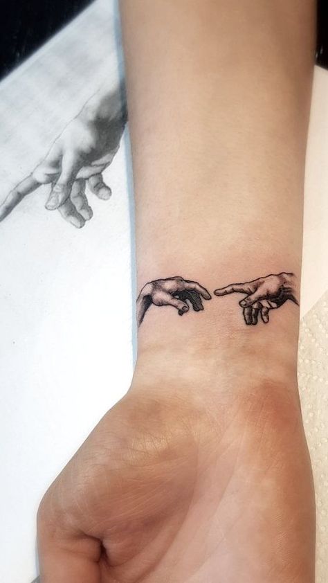 50 Coolest Hand Tattoo for Men & Women #tattoosleeve #armtattoo #tats #tattooart #tattooartwork #tattoodesign #tattooinspiration #blackandgreytattoo #watercolortattoo #irezumi #traditionaltattoo #neotraditionaltattoo #tattooflash #customtattoo #tattoofreelance #tattooshop #tattoostudio #boldtattoo #fiercetattoo #edgytattoo #powerfultattoo #confidenttattoo #uniqueart #personaltattoo #selfexpressivetattoo #meaningfultattoo #creativetattoo Inner Wrist Tattoos, Meaningful Tattoos For Men, Thigh Tattoo Men, Wrist Band Tattoo, Band Tattoos For Men, Black Men Tattoos, Unique Tattoos For Men, Small Forearm Tattoos, Wrist Tattoos For Guys