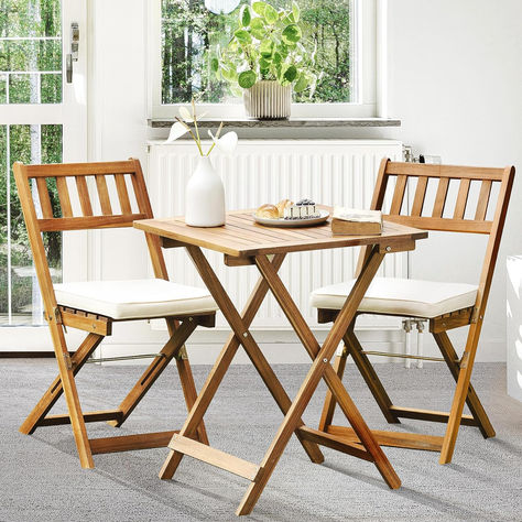 Great price on this french country inspired bistro set. I imagine many coffee breaks on the porch here. Bistro Patio Set, Bistro Table Set, Wooden Folding Chairs, Outdoor Bistro, Bistro Table Outdoor, Minimalist Apartment Style, Outdoor Folding Chairs, Outdoor Bistro Set, Balcony Furniture