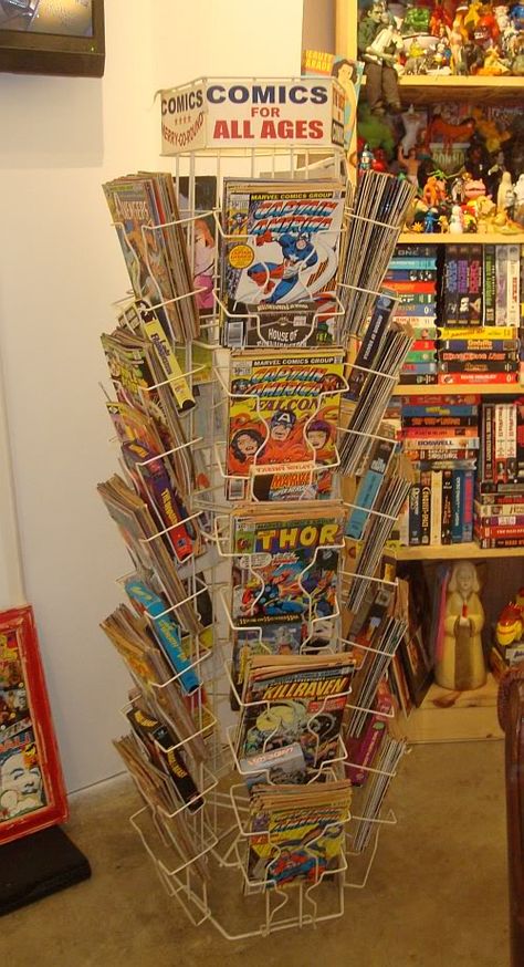 comic book rack - known as a spinnner rack - Marvel and DC comics competed for our money... O often chose Marvel comics Comic Storage, Comic Book Display, Comic Room, Comic Book Storage, Floating Bookshelves, Comic Book Collection, Book Rack, Comic Book Store, Storing Books