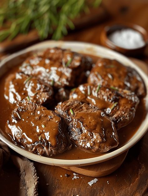 Give this nostalgic, budget-friendly Amish dinner a try for the ultimate in down-home, gravy-licious comfort food satisfaction. Simple ingredients, maximum flavor! Ingredients: Instructions: In a bowl, mix together the ground beef, milk, cracker crumbs, salt, pepper, and finely chopped onion until well combined. Form the beef mixture into a loaf shape and place it on […] Poormans Steak, Amish Poor Man’s Steak, Poor Man’s Steak, Poor Mans Steak Ground Beef, Hamburger Steak Recipes, Hamburger Recipes Patty, Poor Man, Hamburger Recipes, Vegetable Side