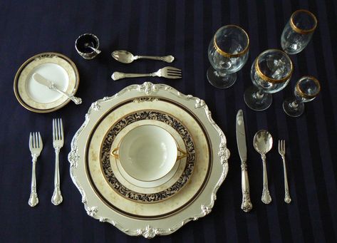 Formal place setting with oyster fork on the right and dessert fork and spoon above the charger Proper Place Setting, Proper Table Setting, Formal Dinner Table, Formal Table Setting, Oyster Fork, Dinner Places, Dining Etiquette, Table Place Settings, Table Manners