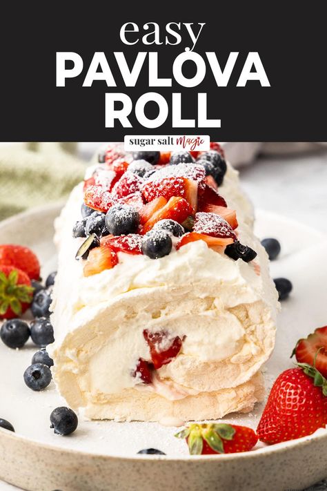 This pavlova roll, aka meringue roulade, is a great twist on the traditional pavlova. Cloud-like meringue and whipped cream studded with fresh berries. Pavlova Roulade, Pavlova Roll, Pavlova Recipes, Meringue Recipes, Easy Meringues, Meringue Roulade, Roulade Recipe, Pavlova Dessert, Meringue Pavlova