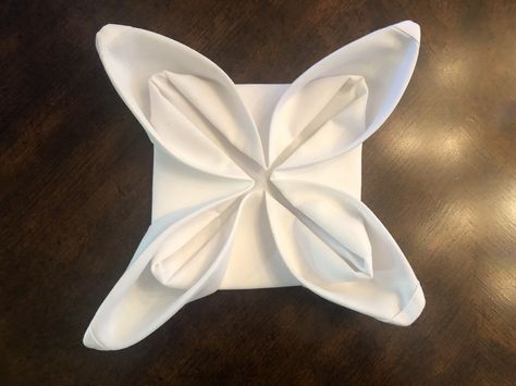 Butterfly Napkin Fold, Square Napkin Folding Ideas, Flower Napkin Folding, Flower Napkin Fold, Napkin Folding Flower, Crystal Drinkware, Centerpieces Candles, Cloth Napkin Folding, Wedding Table Decor Ideas