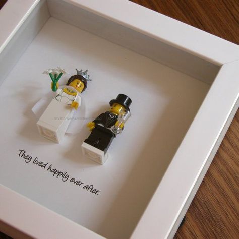 Art frame feature two LEGO®️️ minifigures, Bride and Groom with the a quote: ‘They lived happily ever after beneath. Its the perfect gift for Lego Wedding, Homemade Wedding Gifts, Wedding Gifts For Bride And Groom, Homemade Wedding, Diy Wedding Gifts, Wedding Engagement Gifts, Best Wedding Gifts, Lego Minifigure, Married Couples