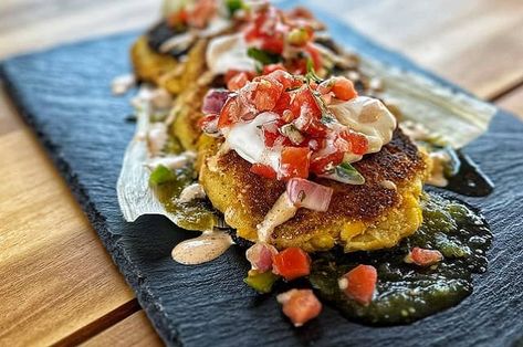 Griddled Sweet Corn Tamale Cakes - Tailgater Magazine Sweet Corn Tamale Cakes, Corn Tamale Cakes, Tamale Cakes, Sweet Corn Bread, Corn Tamales, Cuban Spanish, Griddle Cakes, Tomatillo Salsa, Corn Cakes