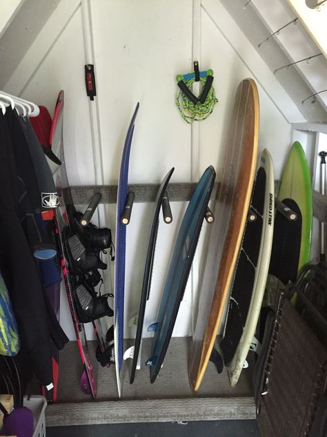 Surf board storage Water Ski Storage Ideas, Water Ski Storage, Lake Shed Organization, Boat Dock Storage Closet Ideas, Kayak Storage Boat House, Surf Board Storage Garage, Lakehouse Storage Shed, Surfboard Shed Storage, Surfboard Storage Shed