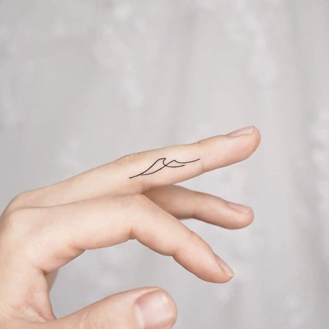 30 Wonderful Wave Tattoo Ideas for Men & Women in 2022 A Finger Tattoo, Wave Tattoo Ideas, Side Finger Tattoos, Inside Finger Tattoos, Inner Finger Tattoo, Simple Wave Tattoo, Finger Tattoo Ideas, Small Wave Tattoo, Wave Tattoo Design